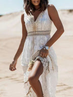 Ethereal V-neck lace sleeveless maxi dress with tassel accents, flowing fabric and elegant design by Trendsi.