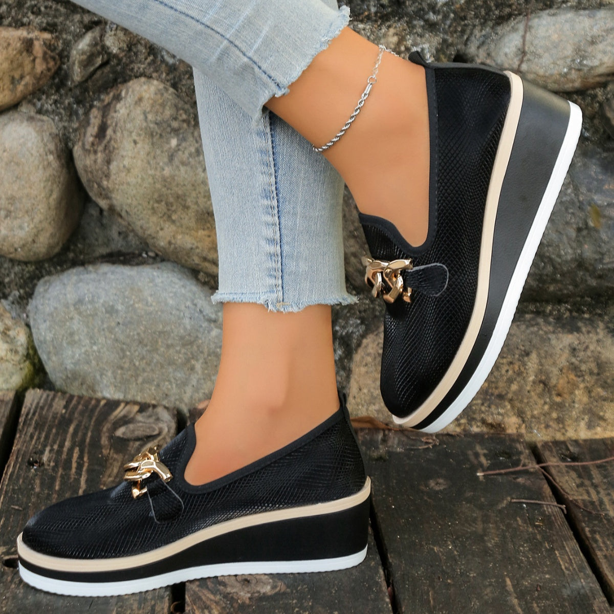 Chain decor wedge loafers from Trendsi featuring stylish footwear with chain accents and comfortable wedge heels.