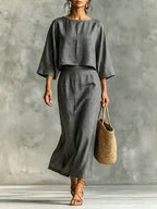 Casualwear set with high waist long skirt and 3/4 sleeve loose top from Plush Fashion Hub, shown in natural fabric and relaxed fit.