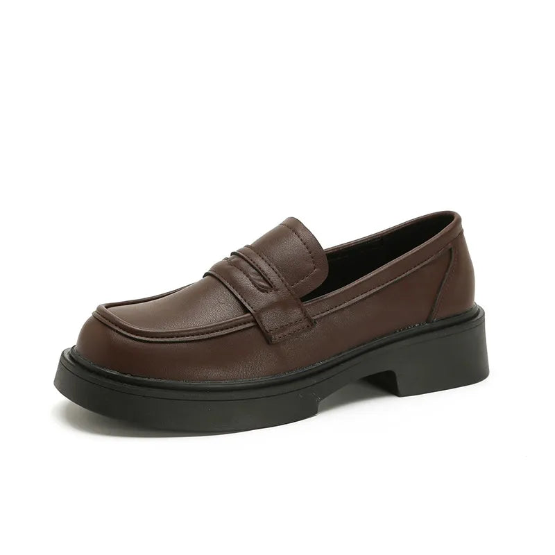 Women's round toe platform loafers by Trendsi, featuring a stylish design with a chunky sole and classic loafer silhouette.