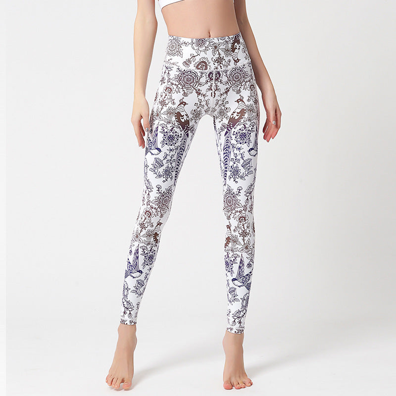 Marble print purple high-waist yoga leggings by FitiqueFit, featuring a sculpted fit and vibrant purple and white design.