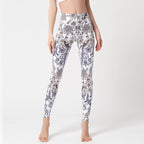 Marble print purple high-waist yoga leggings by FitiqueFit, featuring a sculpted fit and vibrant purple and white design.
