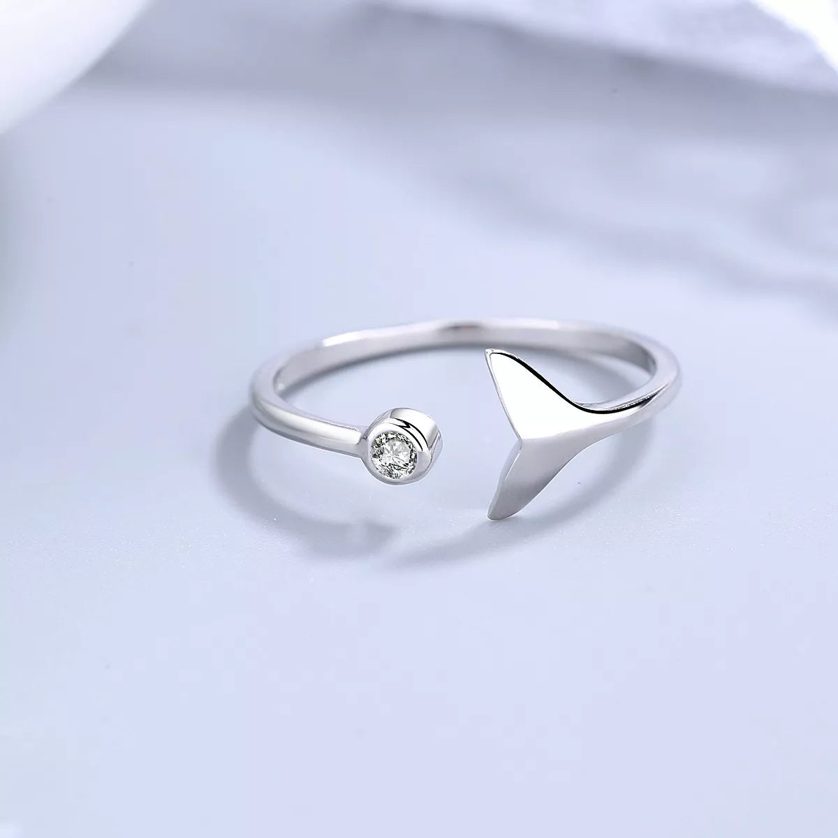 Sterling silver whale tail ring with detailed design, crafted by Plush Fashion Hub, showcasing a smooth, polished finish.