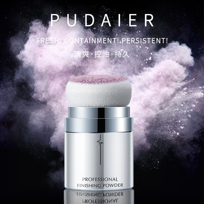 Silver PUDAIER professional finishing powder container with white puff and purple powder on a black background.