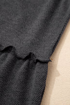 Light blue Macie a Line Tank Top by Threaded Pear displayed on a hanger, showcasing its fitted design and soft fabric.
