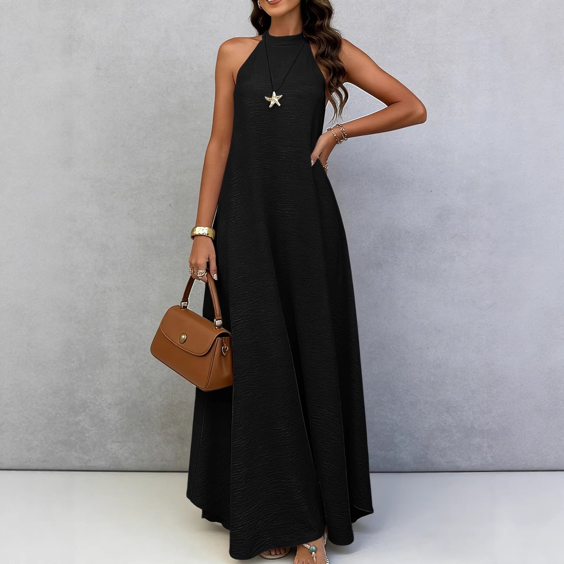 Women's ice silk crinkle sleeveless swing maxi dress in a casual style, featuring a flowing silhouette and lightweight fabric by FitiqueFit.
