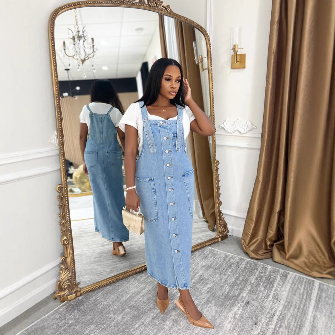 Womens sleeveless denim overall dress with single button closure, casual style by Plush Fashion Hub, front view.
