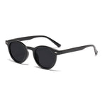 Retro round UV400 sunglasses with European-style tinted frames, stylish eyewear by Plush Fashion Hub.