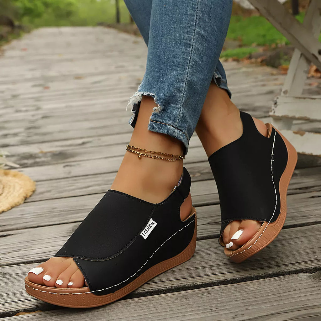 Open toe wedge sandals by Shopimist featuring a stylish design with a comfortable cork wedge heel and adjustable straps.