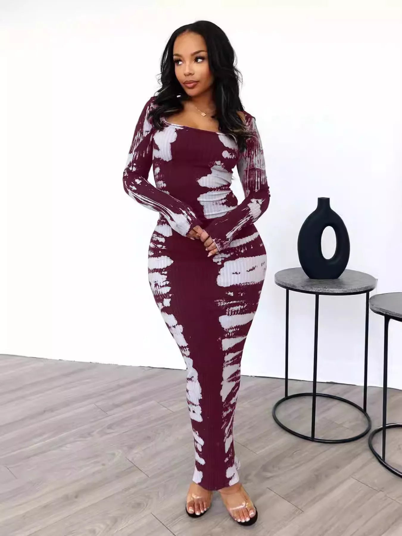 Colorful tie-dye long sleeve maxi dress by Shopimist featuring a flowing design and vibrant patterns.
