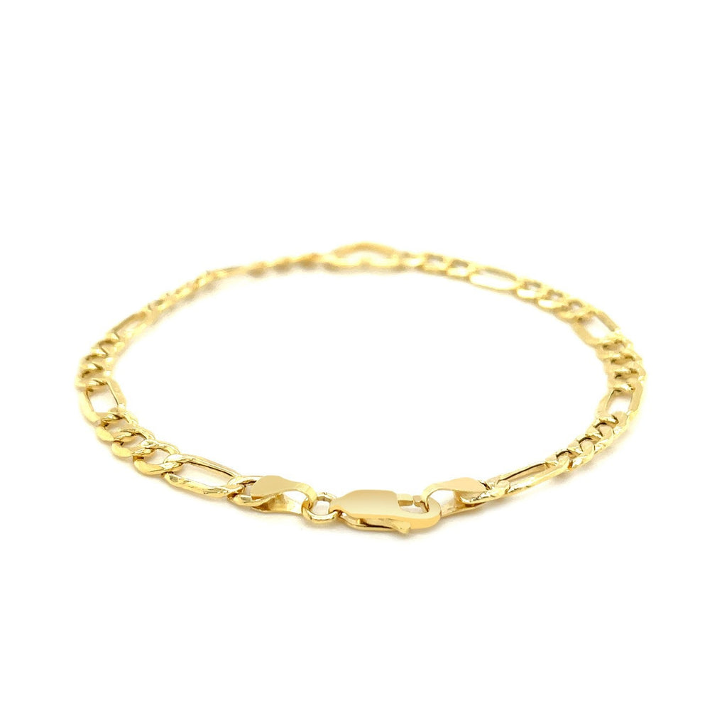 14k yellow gold Figaro chain bracelet with heart charm, 7-inch length, elegant jewelry piece.