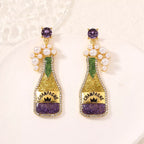 Champagne bottle earrings with pearl accents, stylish jewelry by Shopimist featuring gold-tone details and elegant design.