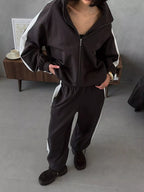 Trendsi zip-up long sleeve outerwear and matching pants tracksuit, casual athletic wear, black with zipper detail, front pockets.