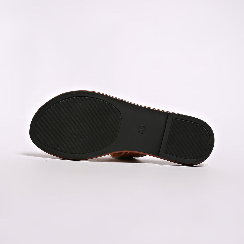 Shopimist buckled leather slide sandals featuring a sleek design with wide straps and a comfortable flat sole.