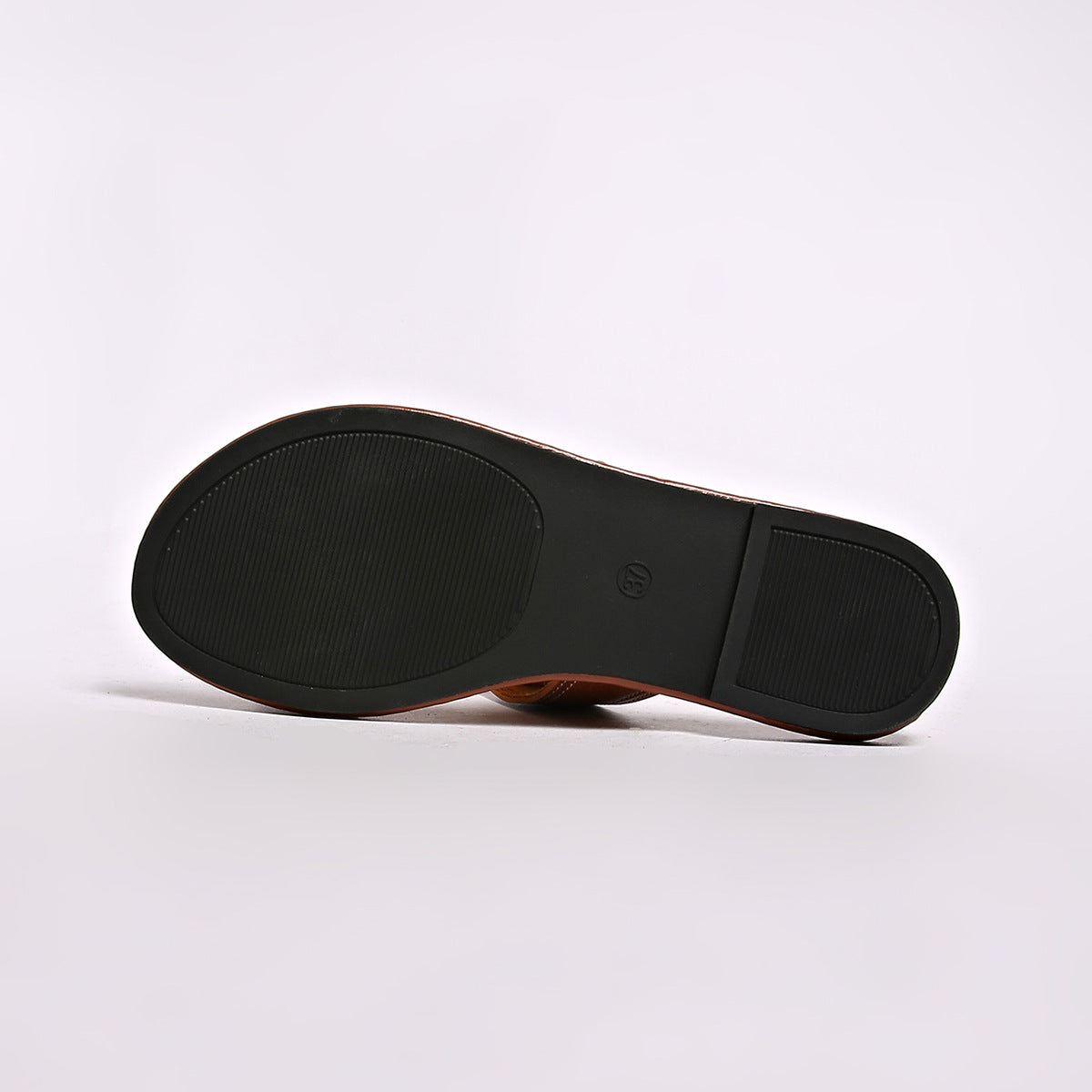 Shopimist buckled leather slide sandals featuring a sleek design with wide straps and a comfortable flat sole.