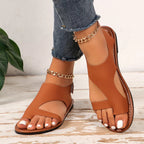 Leather toe loop flats sandals by Shopimist, featuring a sleek design with comfortable straps and a minimalist style.