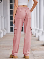 VYSN straight denim cargo pants with multiple pockets, classic blue wash, and relaxed fit for casual everyday style.