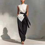 Women's white lace-up sleeveless top and wide-leg pants two-piece casualwear set by Plush Fashion Hub, showing the stylish outfit.