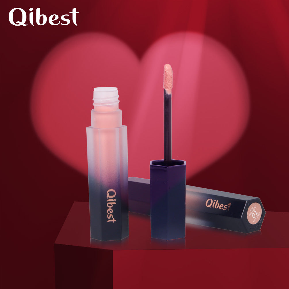 Qibest liquid lipstick with frosted ombre pink-to-black hexagonal tube, matching applicator wand, and boxed packaging.