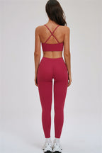 Kinetic cross-back sports bra and leggings set by Fitglutes Activewear, featuring a stylish workout outfit with supportive fit and athletic design.