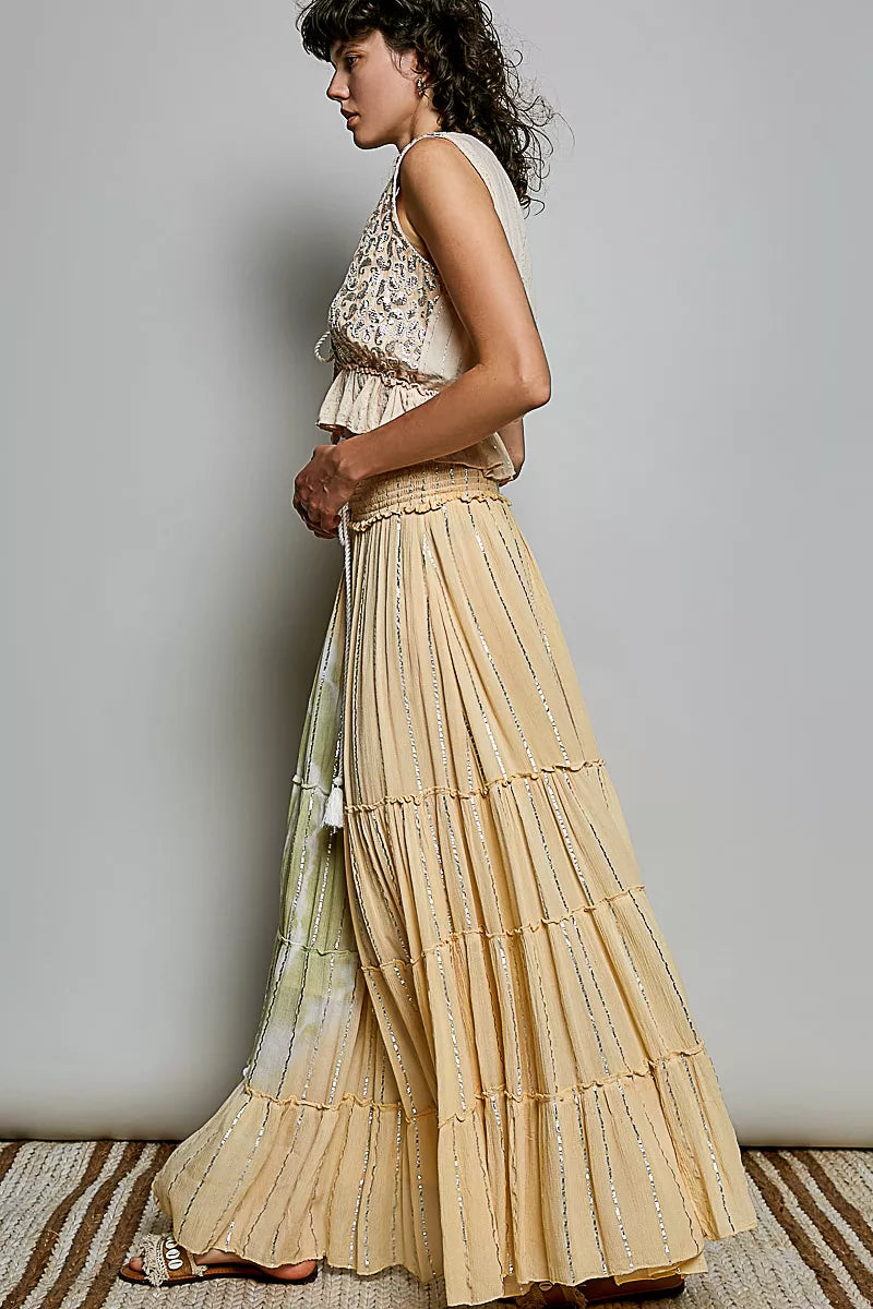 Shopimist POL shimmer tiered reverse ruffle maxi skirt with smocked waist, flowing design, and shimmering fabric for a stylish look.
