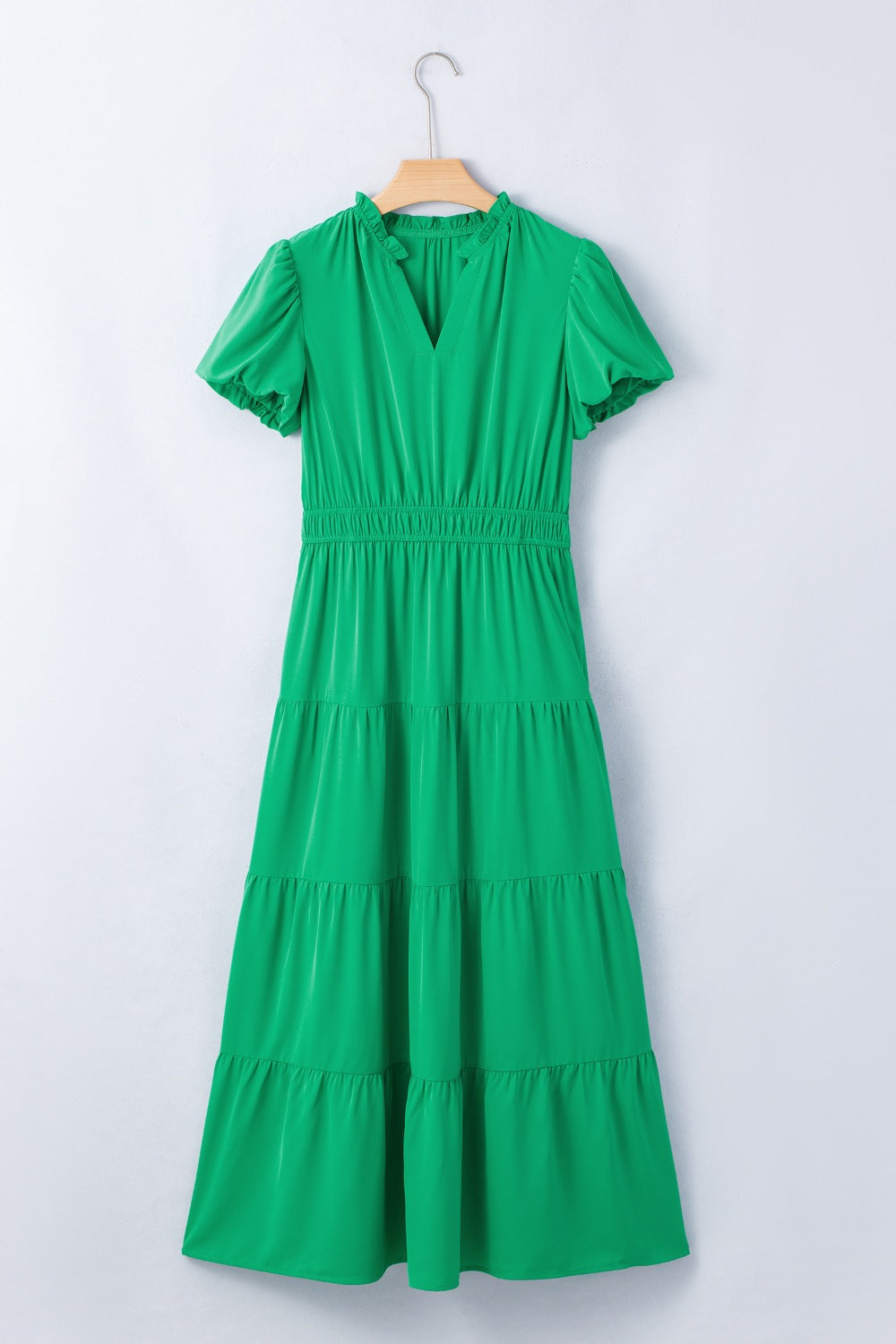 Women's ruffled tiered puff sleeve maxi dress by Plush Fashion Hub featuring an elegant floral pattern and flowing long skirt.