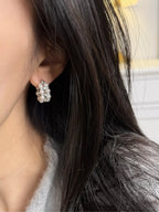 Pearl hoop earrings by Shopimist featuring classic round pearl charms on silver hoops, stylish and elegant accessory for any occasion.