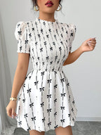 Shopimist smocked bow print short sleeve dress with ruffled neckline and lightweight fabric, perfect for warm weather.