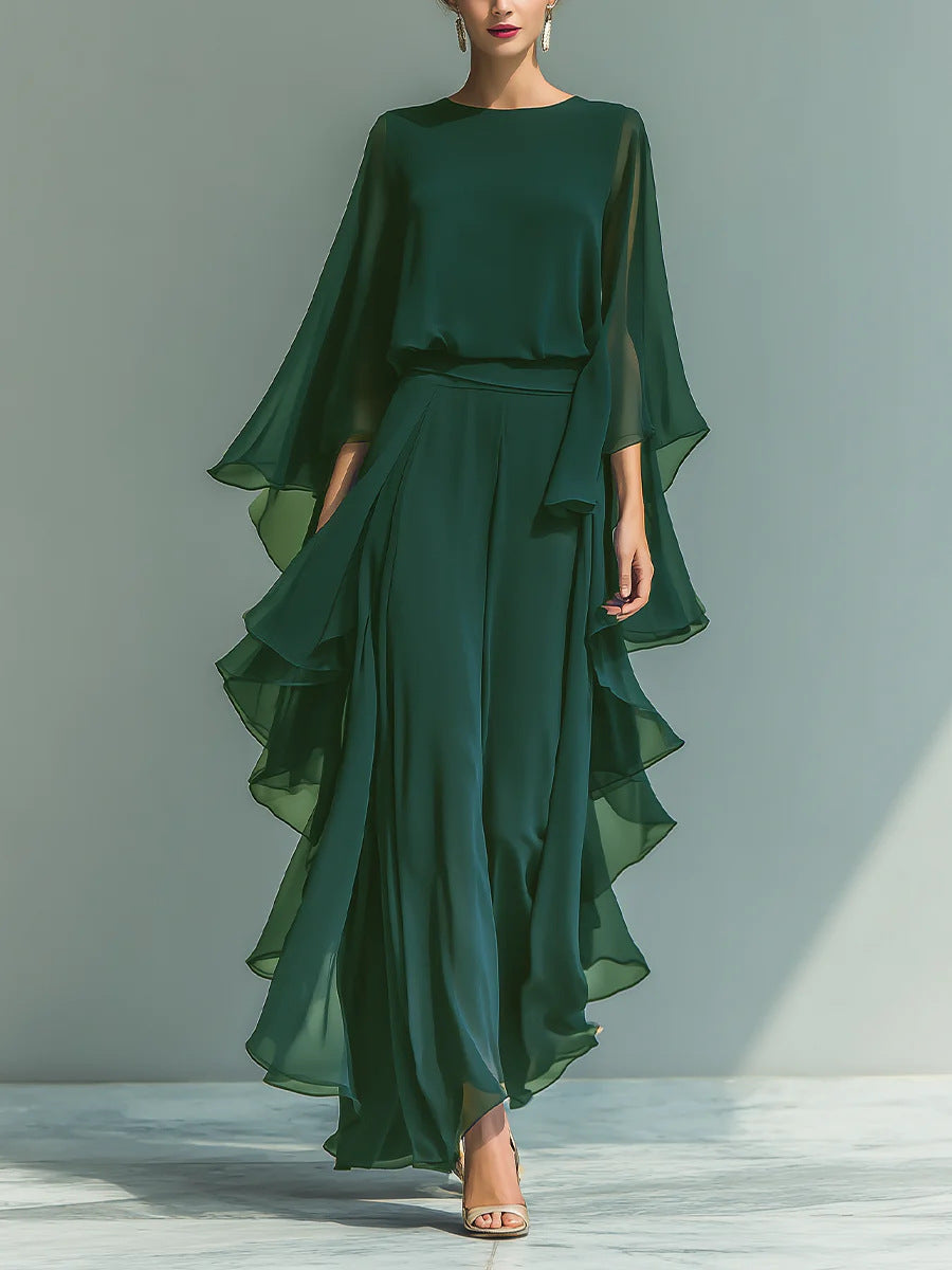 Elegant two-piece women's outfit featuring ruffle-edged wide-leg pants and a long sleeve top from Plush Fashion Hub.
