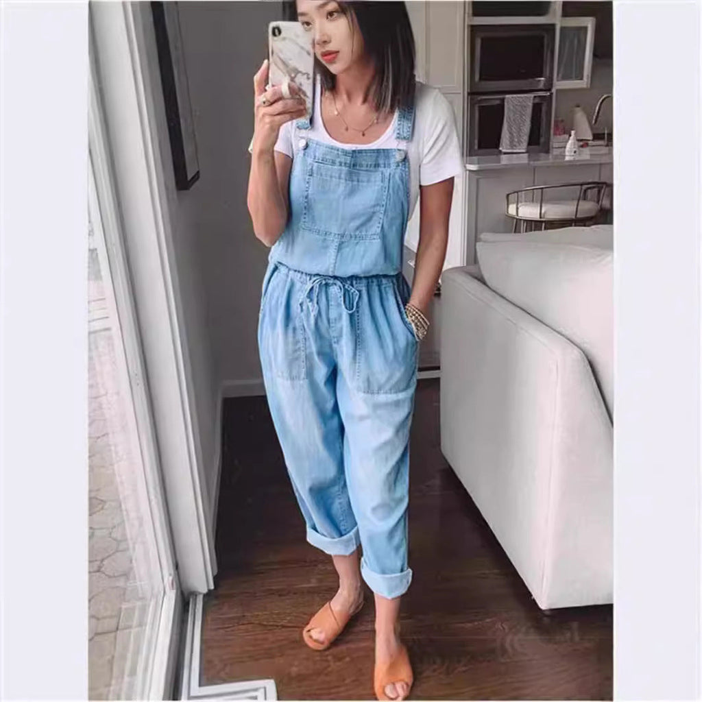 Women's cotton sleeveless wide-leg jumpsuit by Plush Fashion Hub, featuring a relaxed fit and stylish design, shown on a model.