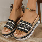 Women's open toe platform mid-heel sandals by Trendsi featuring stylish design, comfortable fit, and chic footwear details.