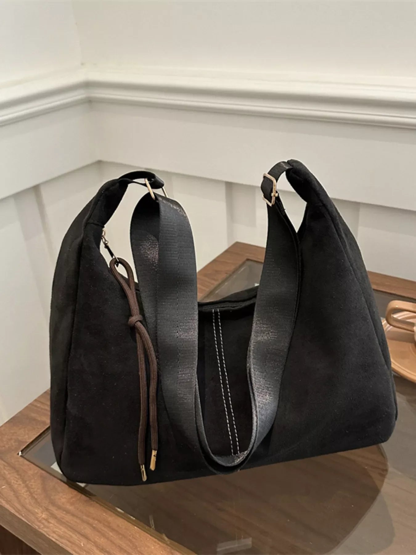 Adjustable strap crossbody bag by Simply Love featuring a sleek design and spacious interior for everyday use.
