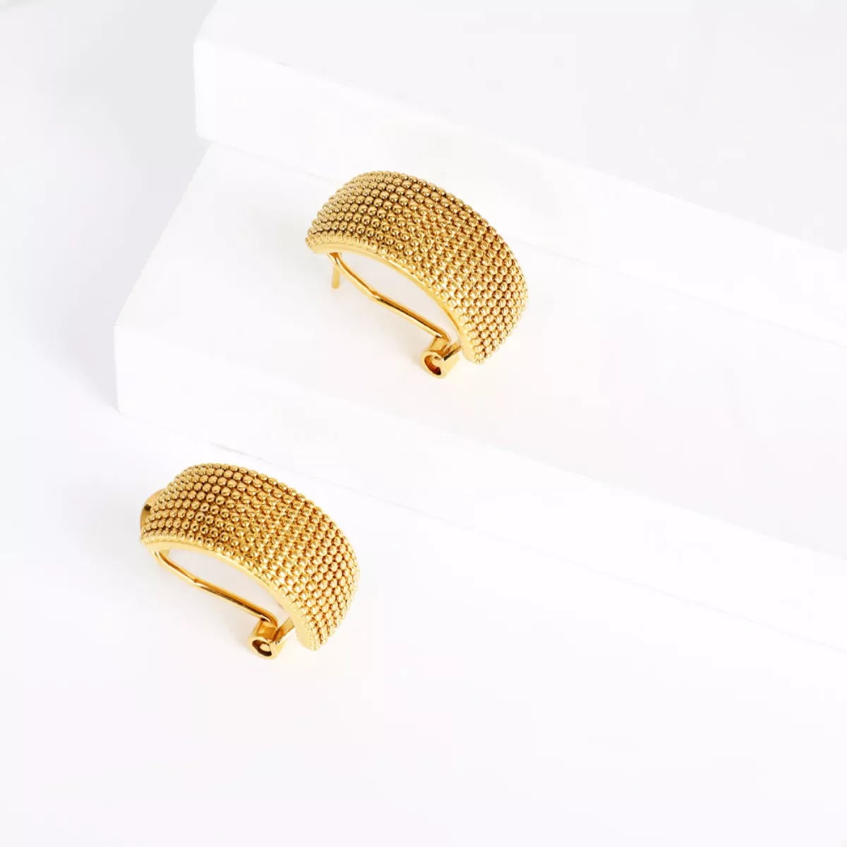 Gold-plated textured wide band hoop earrings from Plush Fashion Hub featuring a bold, contemporary design