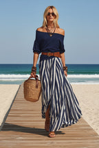 Women's off-shoulder top and slit maxi skirt set by Plush Fashion Hub, casualwear with a stylish off-shoulder design and flowing skirt