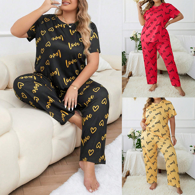 Black, red, and yellow pajama sets with short sleeves, long pants, heart print, and "love" lettering.