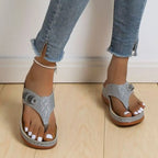 Women's comfortable toe post wedge sandals by Trendsi, featuring stylish summer footwear with a cork wedge heel and open-toe design.
