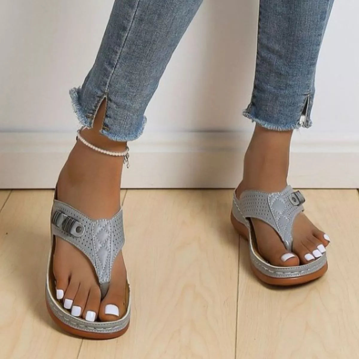 Women's comfortable toe post wedge sandals by Trendsi, featuring stylish summer footwear with a cork wedge heel and open-toe design.