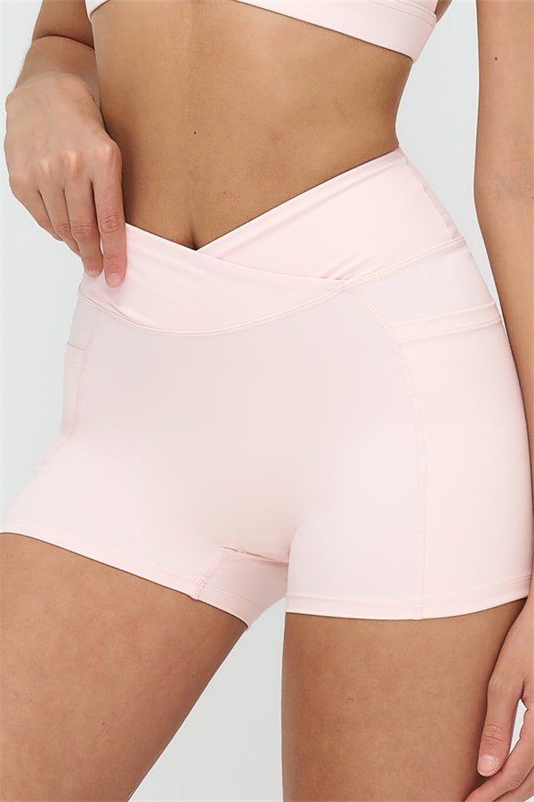 Fitglutes Activewear crop top and shorts 2-piece set, perfect for gym workouts and sports, featuring comfortable, stylish athletic apparel.