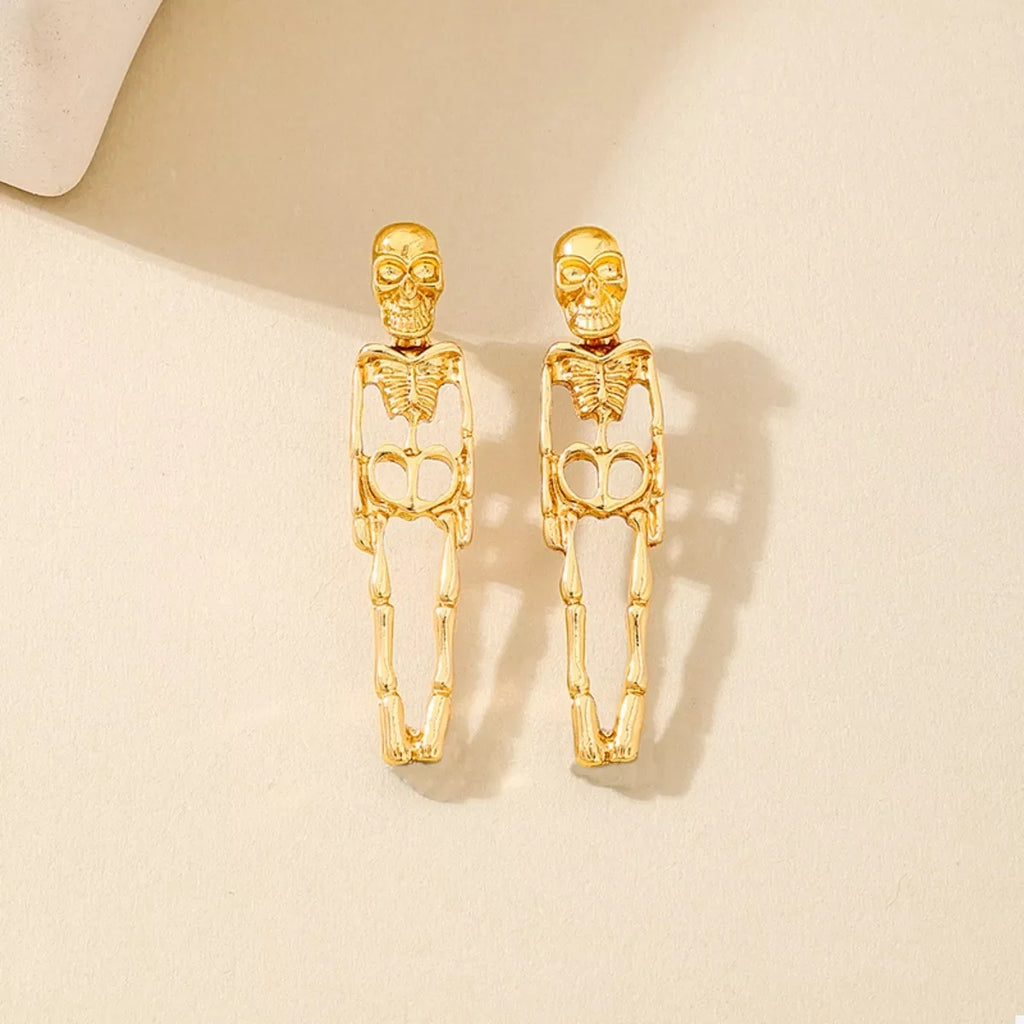 Gold-plated skeleton earrings with Halloween-themed design from Shopimist, featuring intricate skeletal detailing on dangling earrings.