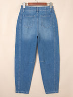 Washed cuffed barrel leg jeans in vintage relaxed fit denim, Trendsi bottoms, displayed on a hanger with a casual style.