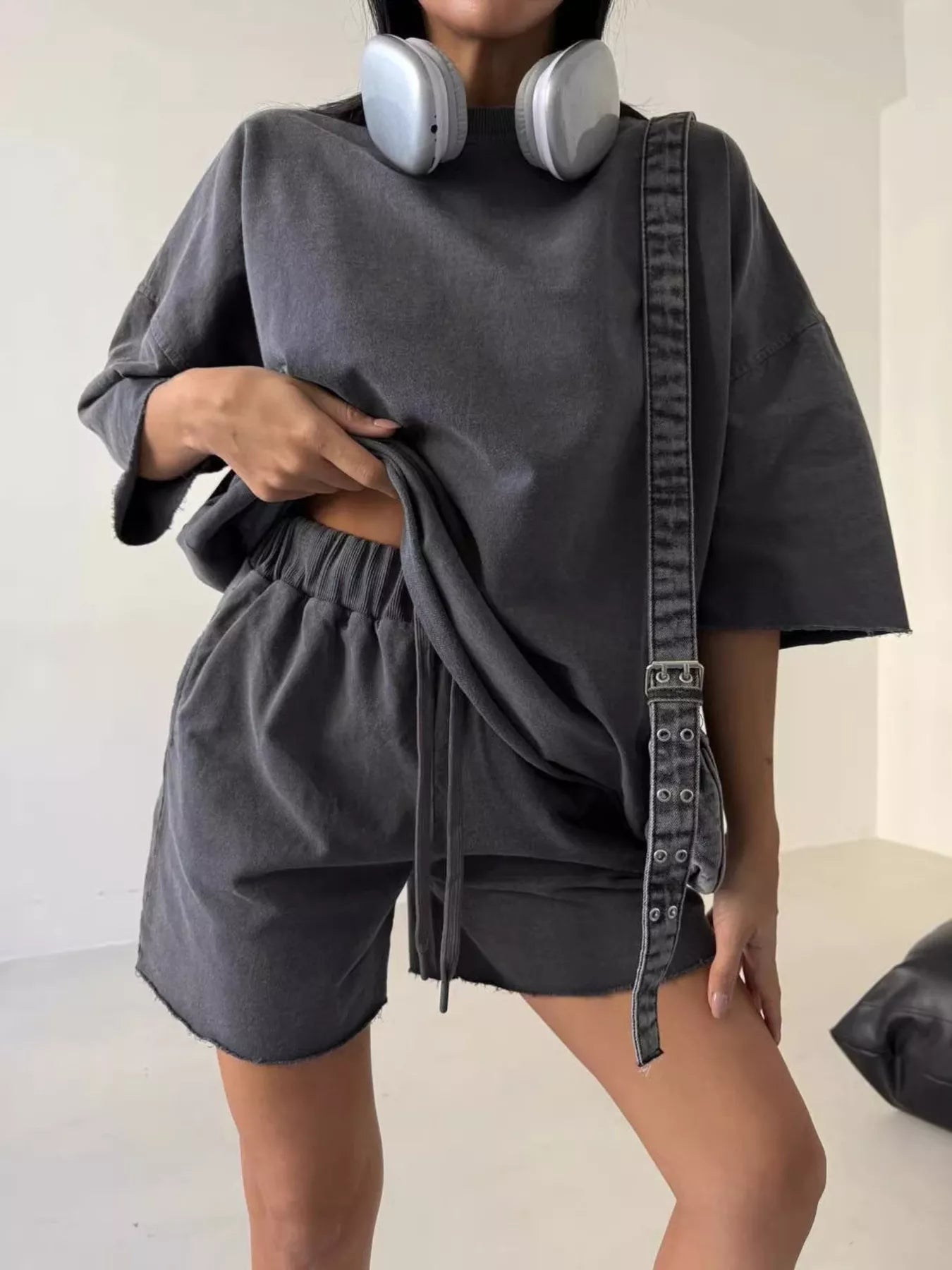 Vintage wash oversized lounge set with a relaxed tee and shorts, featuring trendy, comfortable fabric from Trendsi.