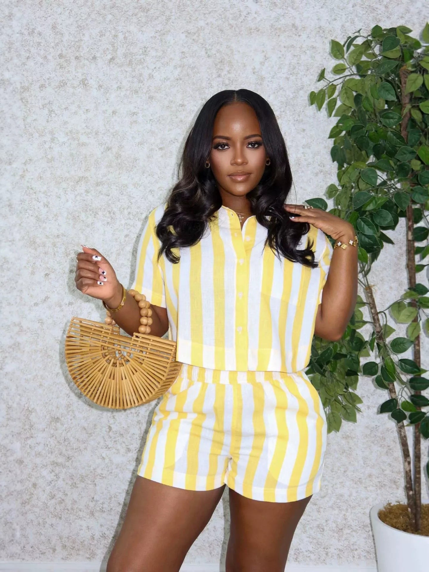 Striped button-up top and shorts set by Shopimist, featuring a stylish coordinated outfit with a lightweight fabric and casual fit.