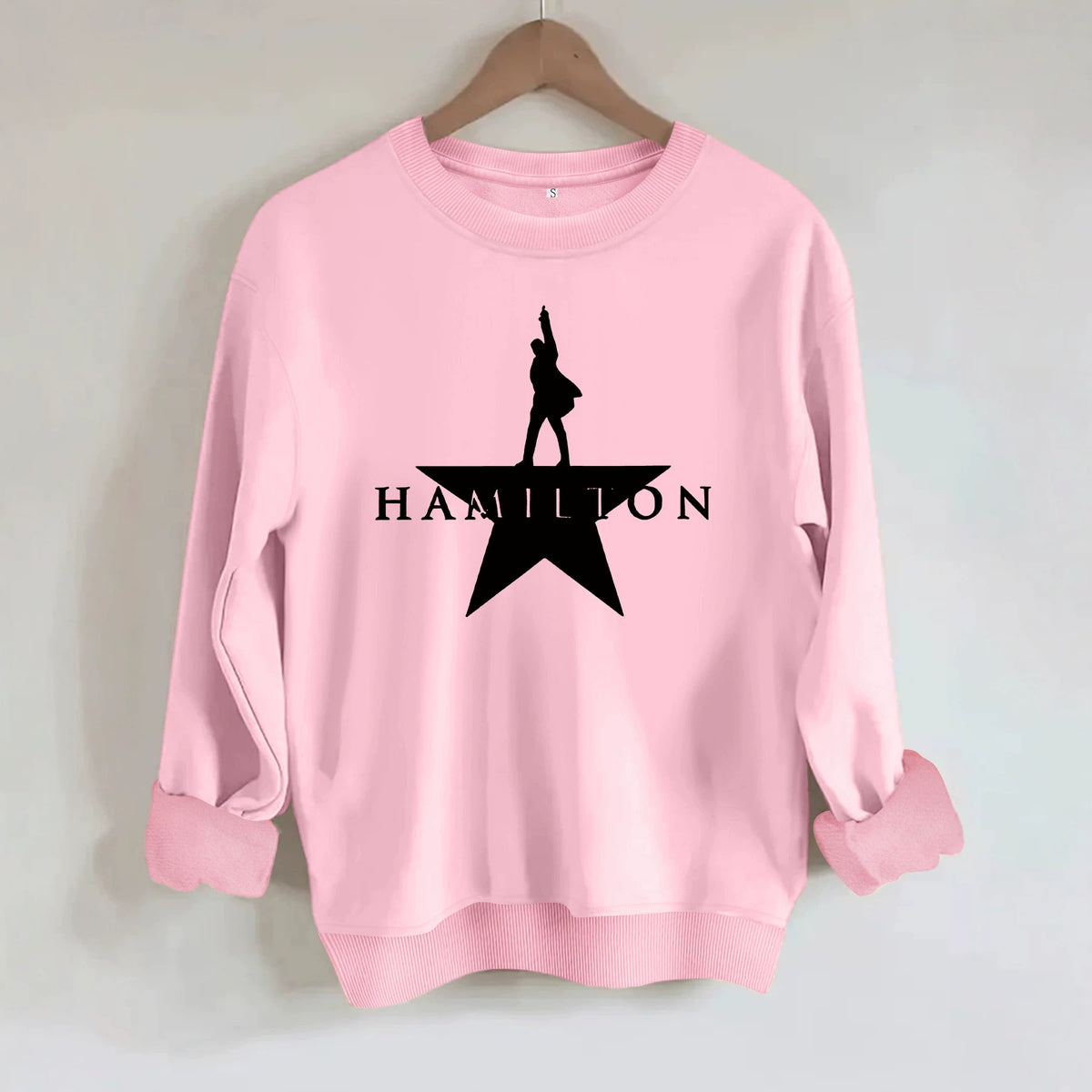 Pink cotton blend sweatshirt with black Hamilton star graphic, crew neck, and ribbed trim.