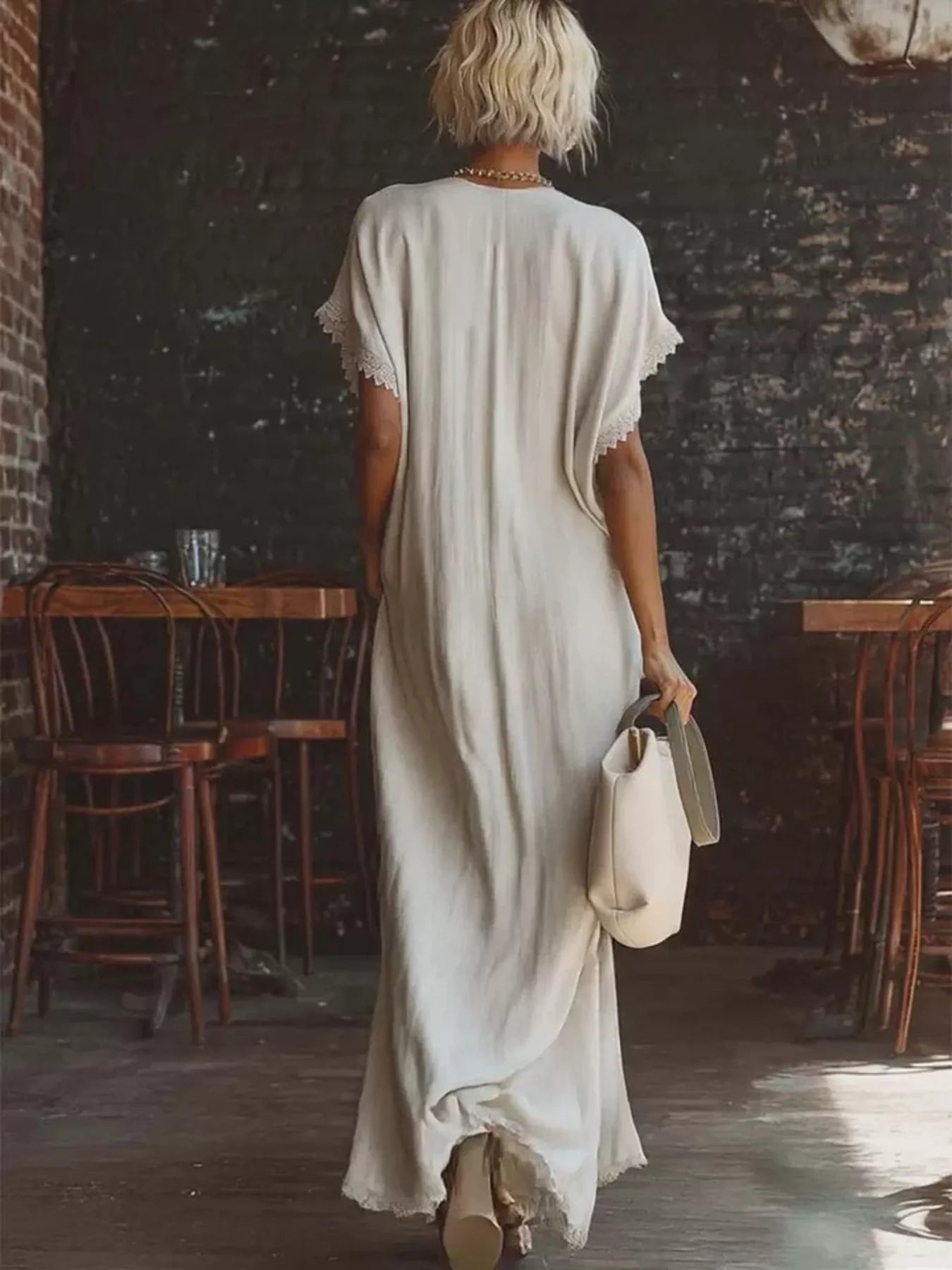 Plus size full-length lace trim V-neck maxi dress by Plush Fashion Hub with elegant design and flowing fabric.