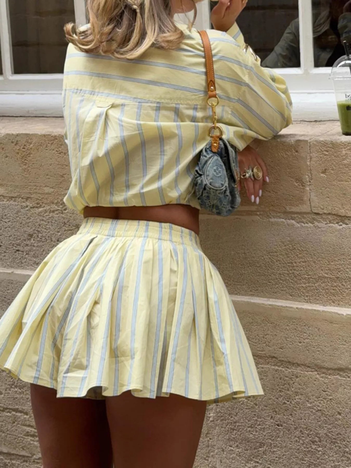 Striped button-up shirt and shorts set by Plush Fashion Hub, featuring a coordinated casual summer outfit for women.