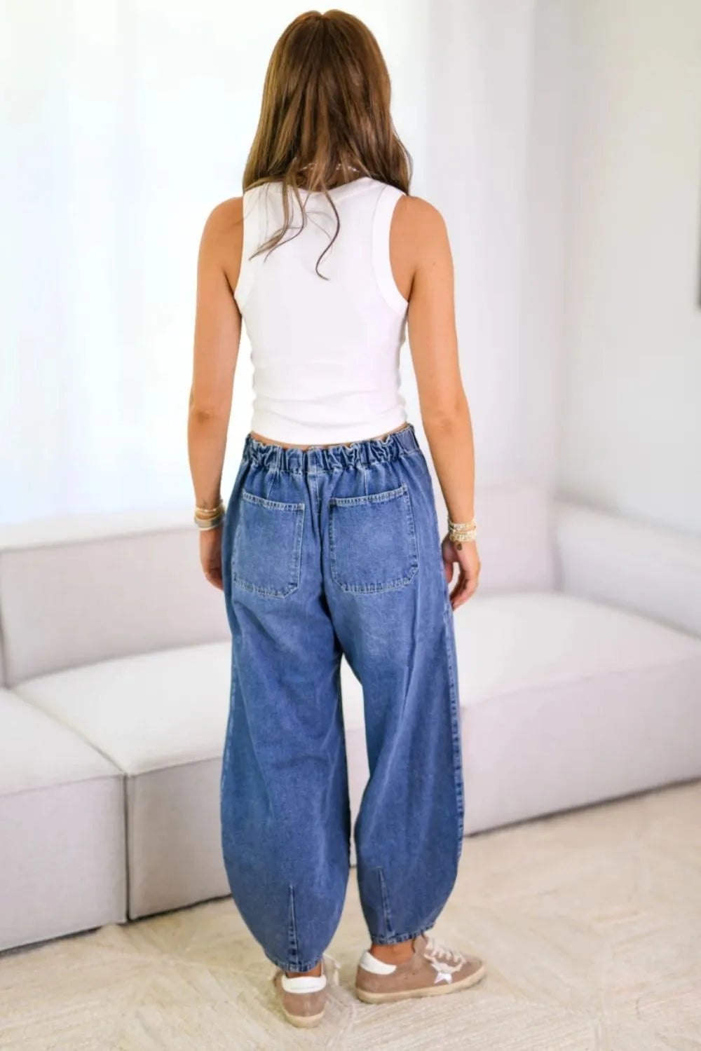 Plush Fashion Shop denim drawstring jeans with front and back pockets, casual style, in classic blue denim fabric.