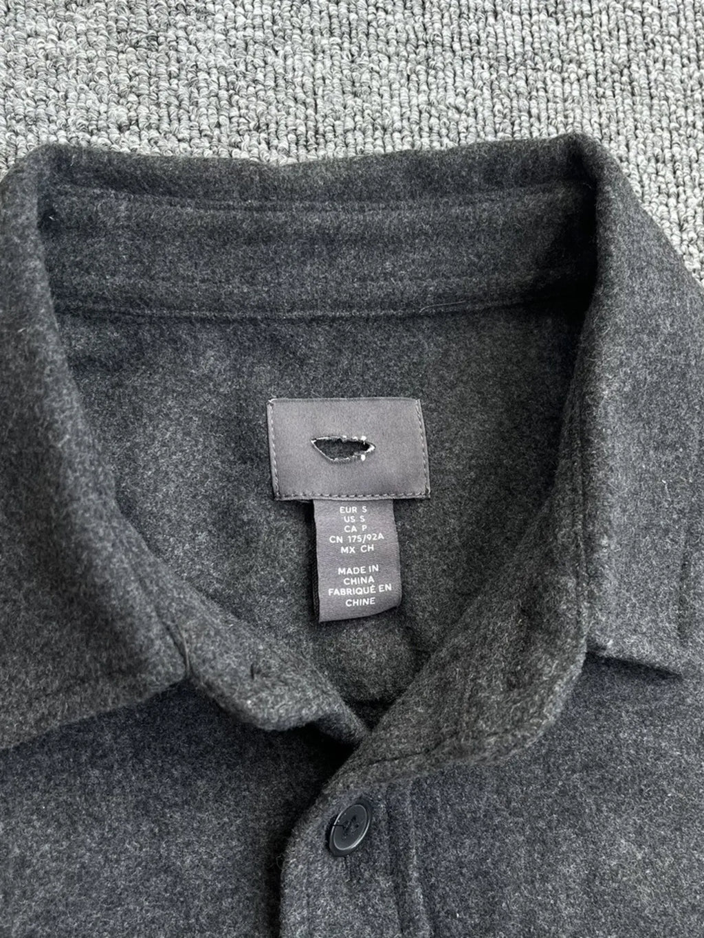 Men's button-up long sleeve shacket by Shopimist, featuring a stylish casual design with buttons and a relaxed fit.