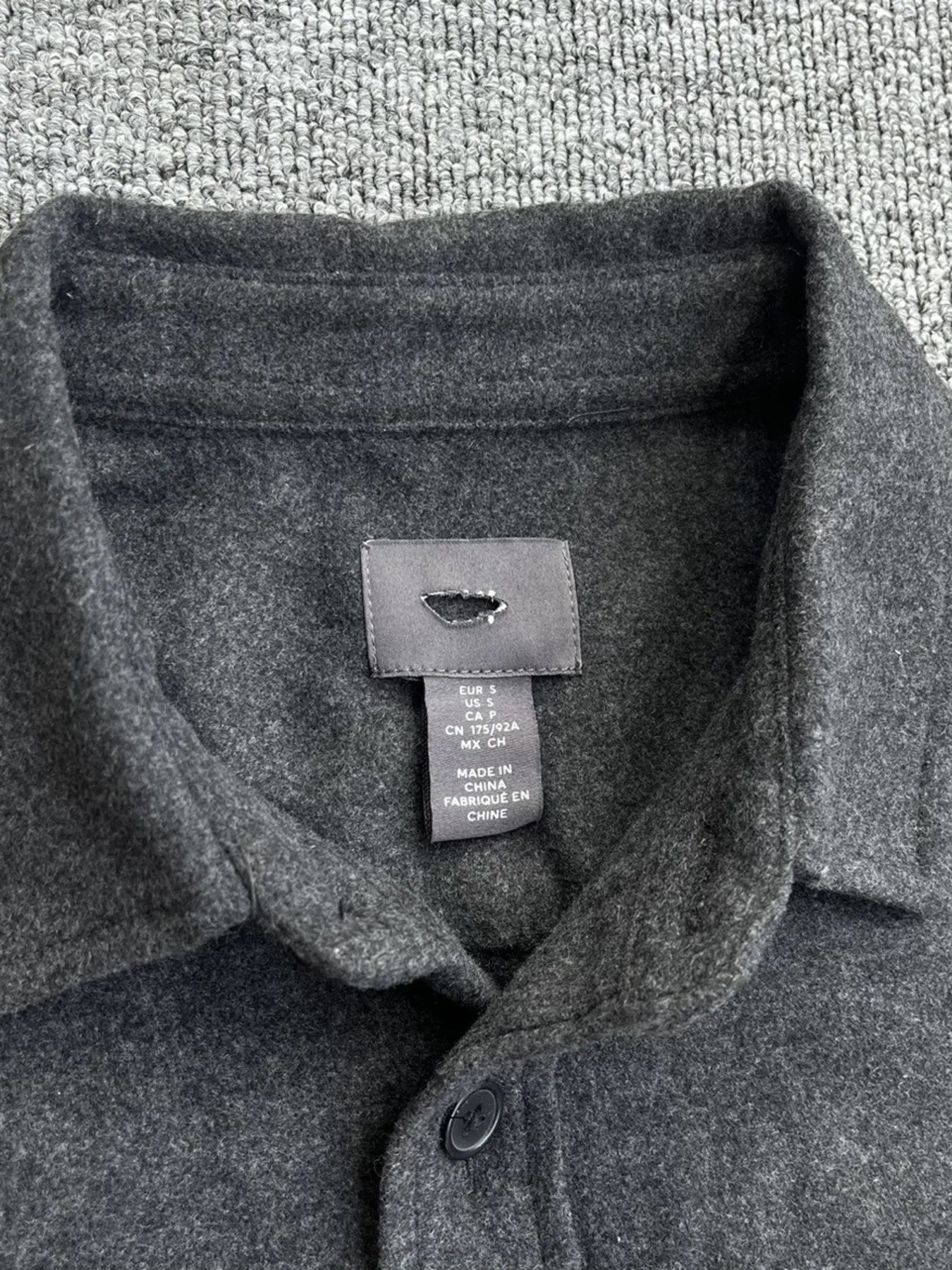 Men's button-up long sleeve shacket by Shopimist, featuring a stylish casual design with buttons and a relaxed fit.