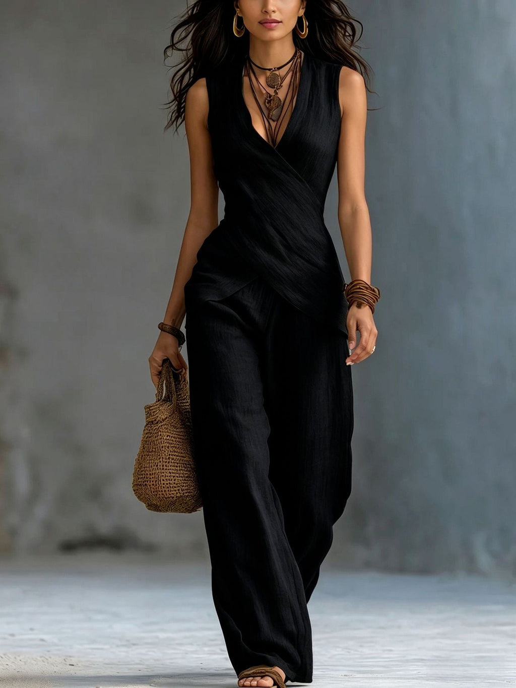 Women’s V-neck crossover tank top and casual trousers two-piece set from Plush Fashion Hub, shown on a model.
