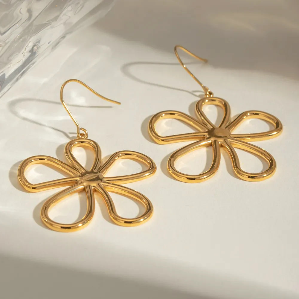 18K gold-plated flower earrings by Shopimist, featuring delicate petal design and intricate detailing on sterling hooks.